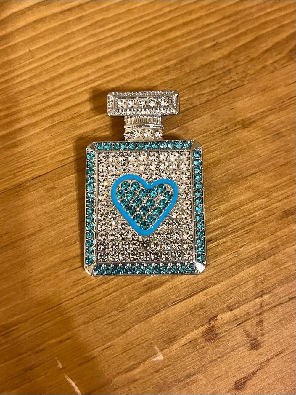 Perfume bottle with blue heart & clear rhinestones on silver tone 2”